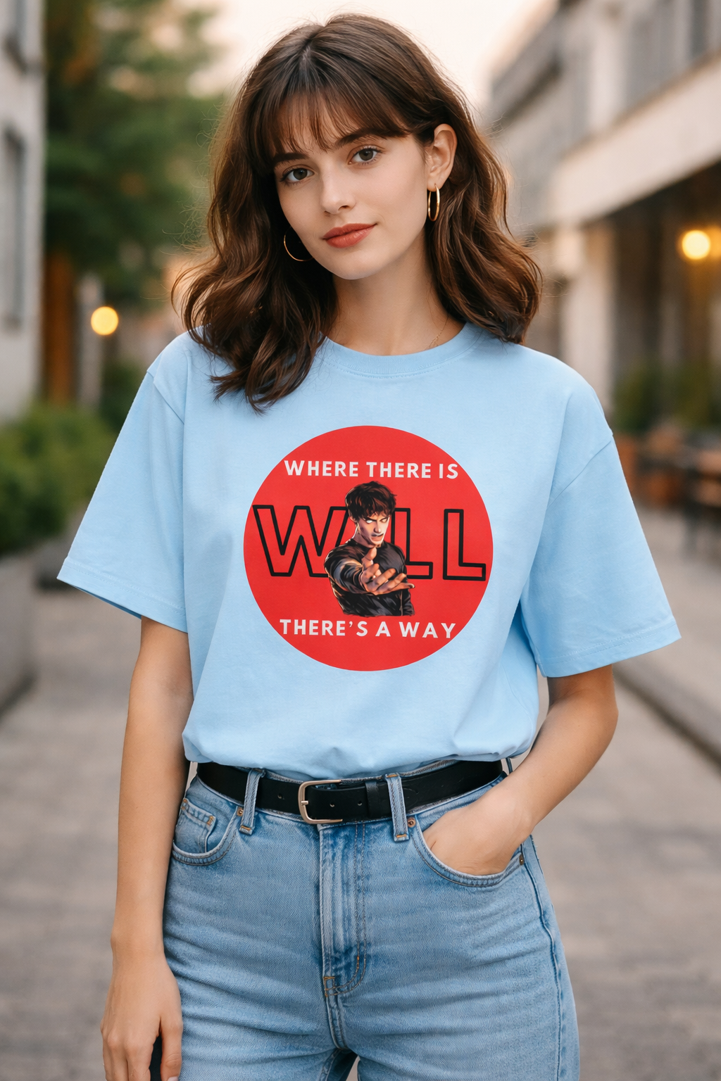 Model wearing baby-blue Stranger Things inspired graphic t-shirt with bold red will design