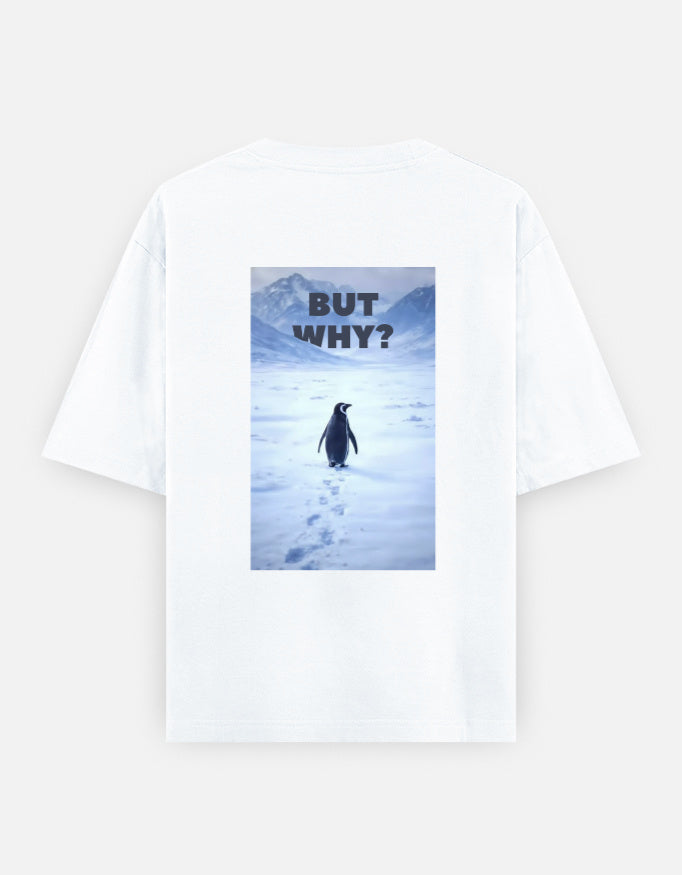 Back view of a white t-shirt featuring a rectangular graphic of a lone penguin walking across a snowy Antarctic landscape toward mountains with the text "BUT WHY?" in bold grey letters.