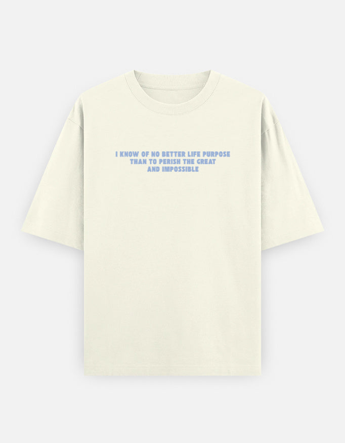 Front view of a off-white oversized t-shirt featuring the quote "I know of no better life purpose than to perish the great and impossible" printed in grey block letters across the chest.