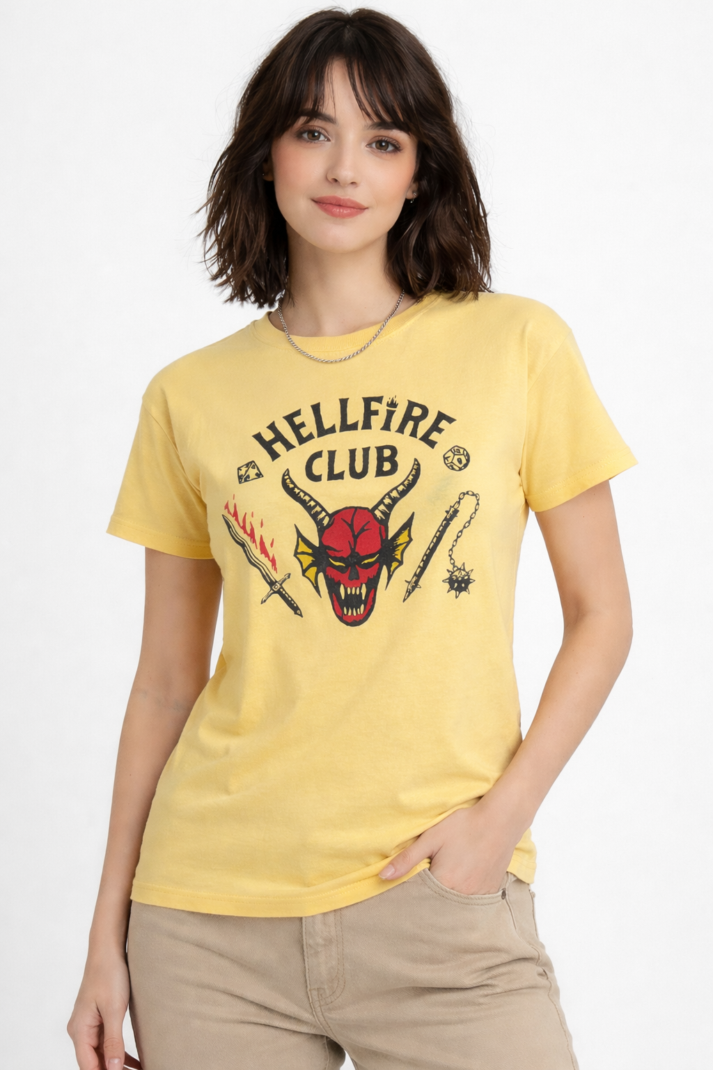 Model wearing yellow Stranger Things inspired graphic t-shirt with Hellfire design